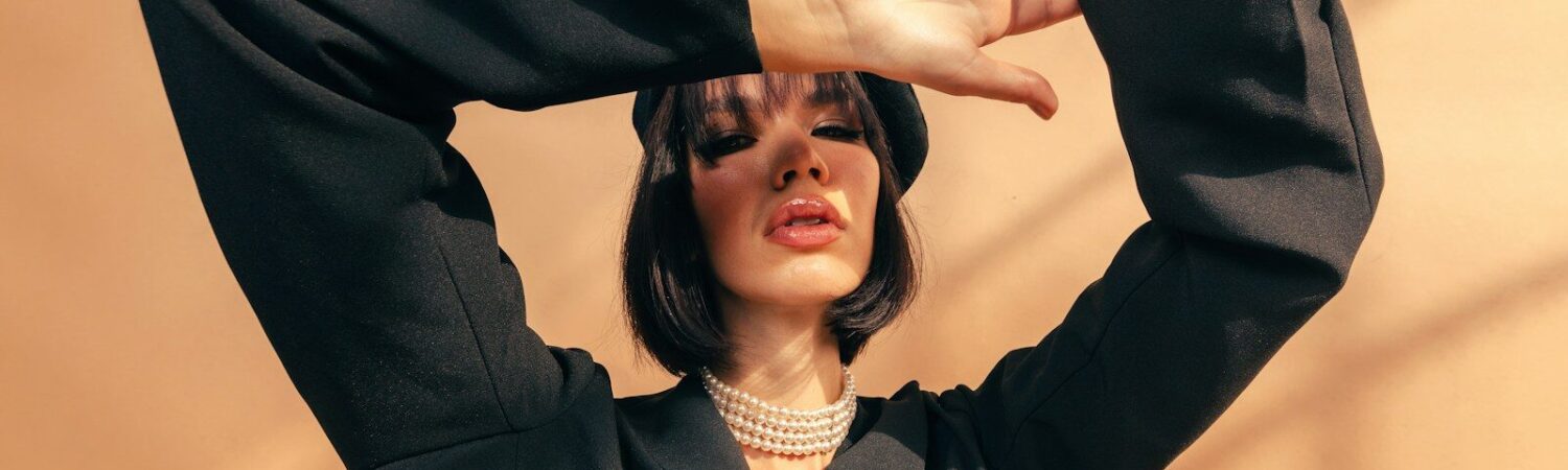 Photo by Dominik kielbasa woman in black blazer smiling